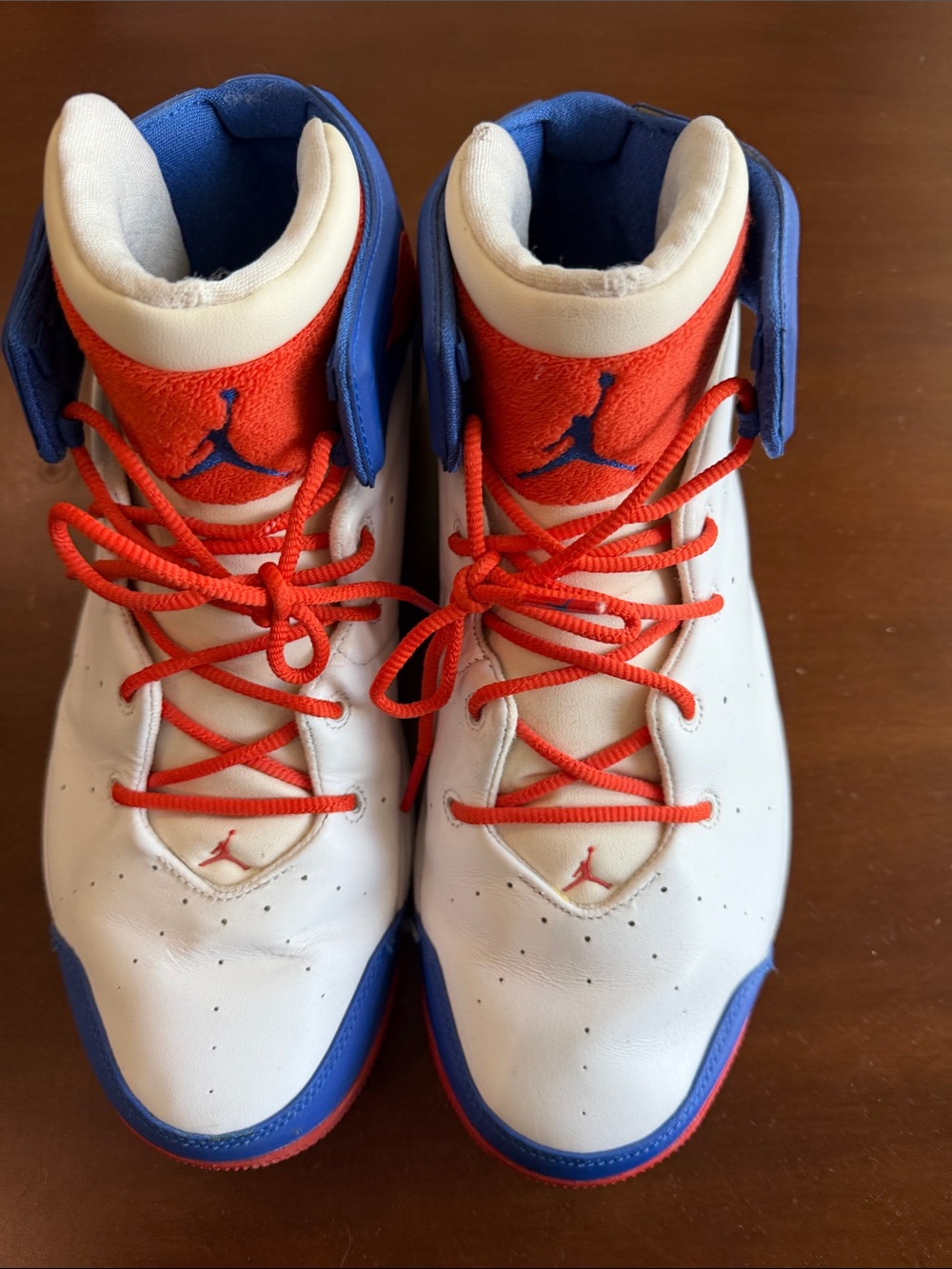 Nike Air Jordan Melo 1.5 Knicks in the white, team orange, and game royal
